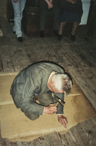 Antoni Jankowski repairing the floor