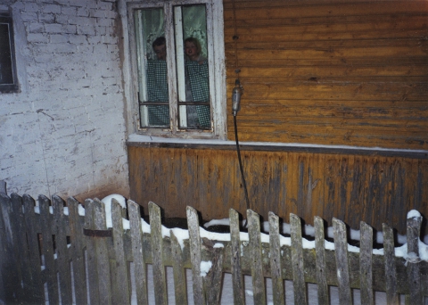 The hosts' children looking out of the window