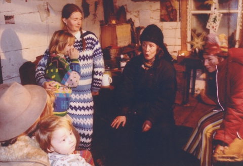 Carol singers visiting the hosts