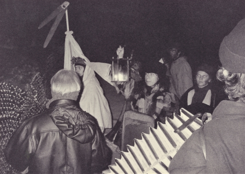 Carol singing in Nowica - scene from the home performance