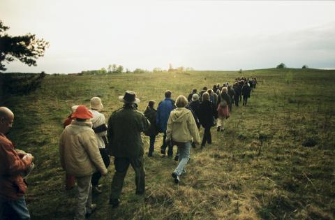 Actors and spectators wandering during the "Missa Pagana" open-air performance - performance - wandering