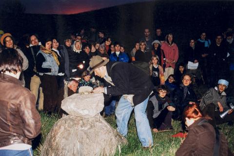 Mieczysław Litwiński performs stone music during the performance-wandering "Missa Pagana "