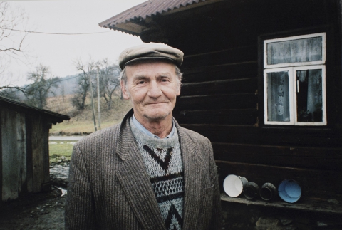 Christmas carolling. The host Krok in front of his house