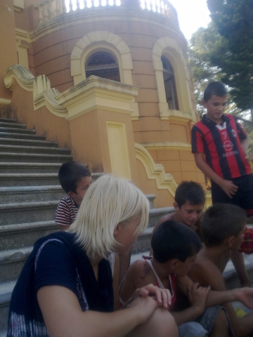 Izabela Giczewska with inhabitants of Zogaj