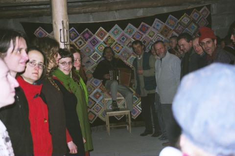 Party - carol singers and hosts dancing during the Easter festival