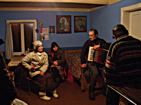 Carol singers visiting the hosts